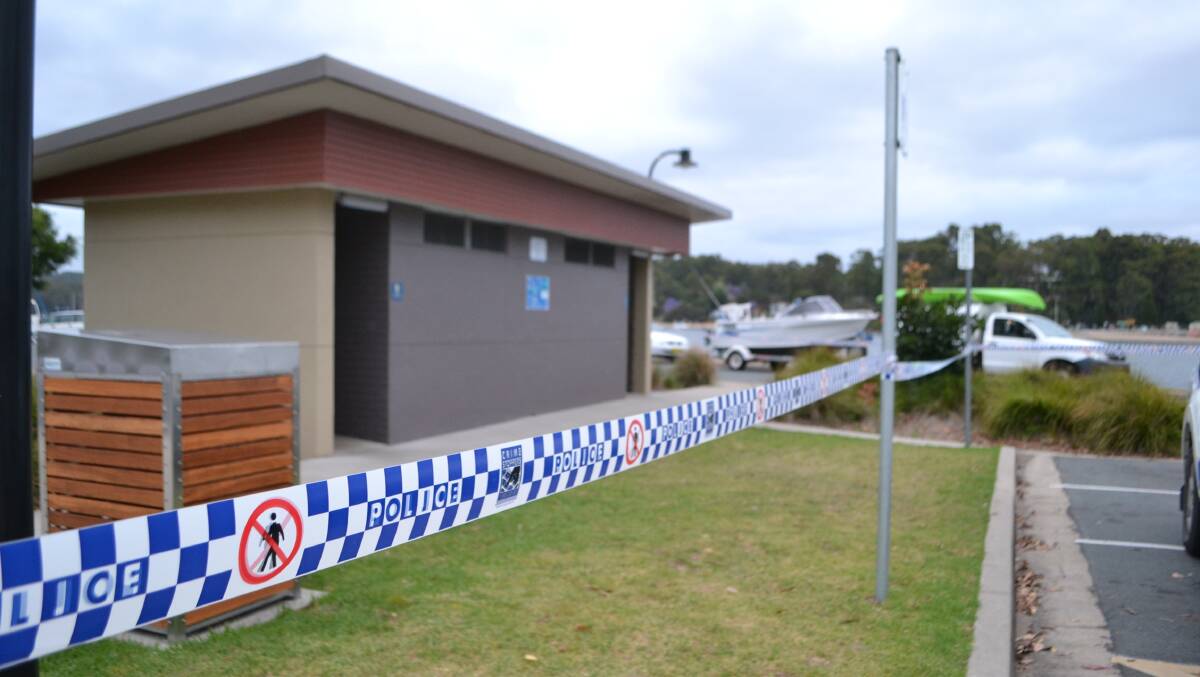 The toilet block at the boat ramp near the Batemans Bay bridge was examined by forensic police on Thursday night.