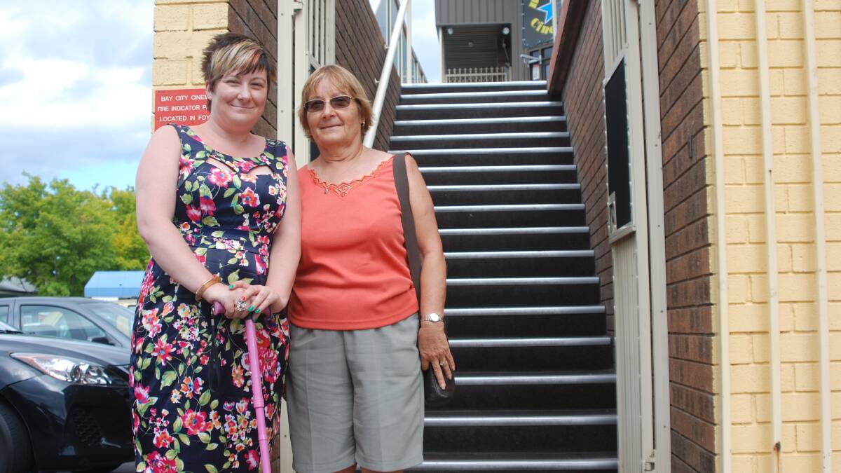 NO ACCESS: Jemima Dickens who is unable to walk upstairs due to a back injury, cannot access the Bay City Cinema because their chair lift is out of order. She is pictured with her mum Claire Dickens.