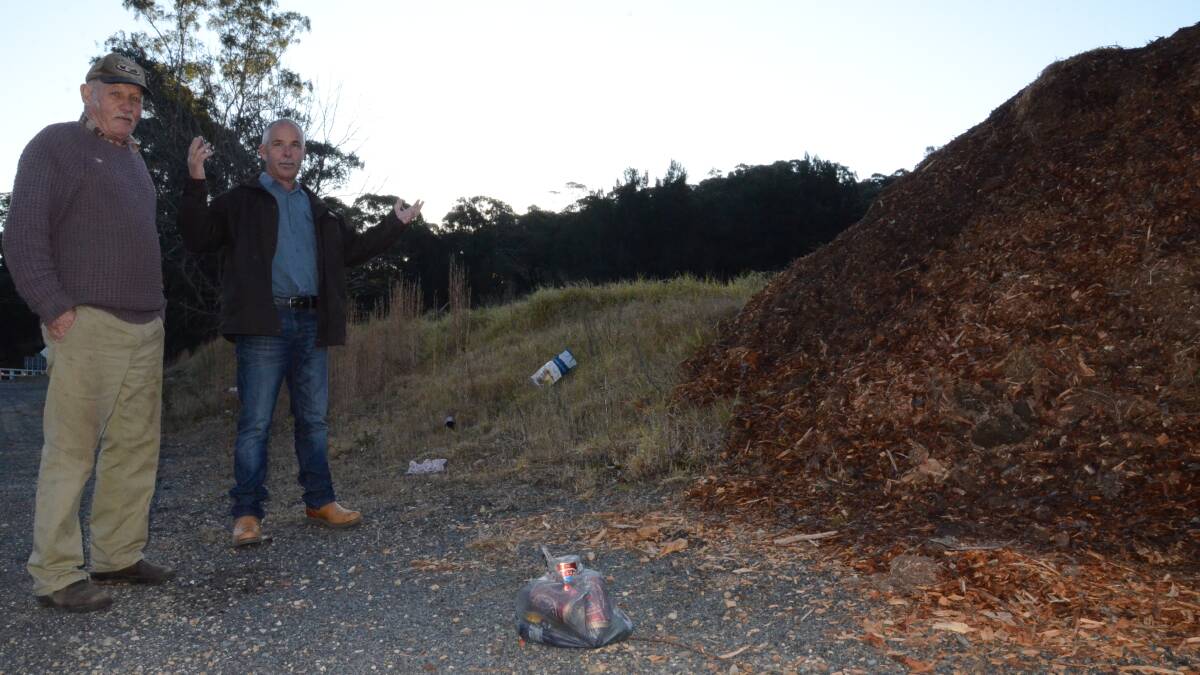 FED UP: Neighbours Rhett Mitchell and Albert Veith, who live west of Nelligen, say cleaning up rubbish travellers dump on the Kings Highway is becoming an expensive and frustrating exercise. On the day the Bay Post/Moruya Examiner visited, a bag of rubbish, a lacy pair of women’s underwear, beer bottles and a wine cask had been discarded outside Mr Veith’s property.