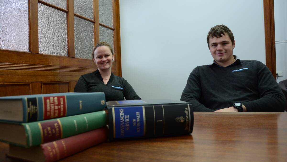 EYES OF THE LAW: Elizabeth Fleming and Associates manager Victoria Fleming and employee Charlie Hall have both benefited from an innovative Mind the Gap program for prospective law students.