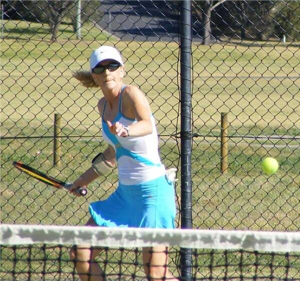 AD LIB:  Libby Ives has this shot covered at the Eurobodalla Seniors Tennis Tournament at Moruya.