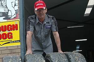 WRITE-OFFS:  Glenn Ford with the tyres of his partner Janelle Hillyar’s car, which were ruined on Tomakin Road on Tuesday.