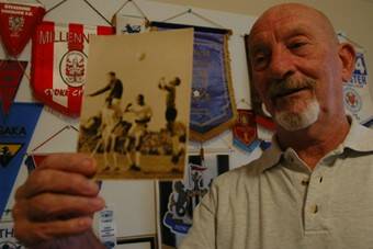 LOCAL SOCCEROO: Pioneer Socceroo Archie Blue with a picture of himself in 1966. He’s the highest player on the left in the photo.