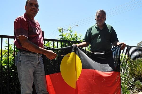 BACK HOME:  Batemans Bay Local Aboriginal Lands Council board member Basil Smith and chairman Les Simon were among the speakers at the repatriation ceremony, which honoured the return of Aboriginal ancestral remains to the area.