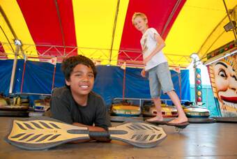 YOUNG FUN: Young carnival travellers Vincent Pillay, 12, and Marshall Karaitiano, 11, ensure the fun lasts through the day at Bell’s Carnival.