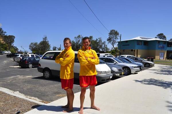 BEACH BOYS:  Broulee Surf Life Saving Club lifeguards Adam Wells and Tony Pobjie are pleased access to the club’s carpark will be closed off for New Year’s celebrations.