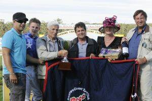 WINNING FEELING:  Moruya trainer Luke Pepper (left), jockey Taylor Lovelock-Wiggins, owners Ken and Robert Thompson, Sapphire Coast Turf Club president Robyn Bain and Bega Cheese general manager, sales and marketing, Maurice Van Ryn, at the presentation ceremony after the running of the $25,000 Bega Cup over 1600m on Sunday. Photo: Bradley Photographers.
