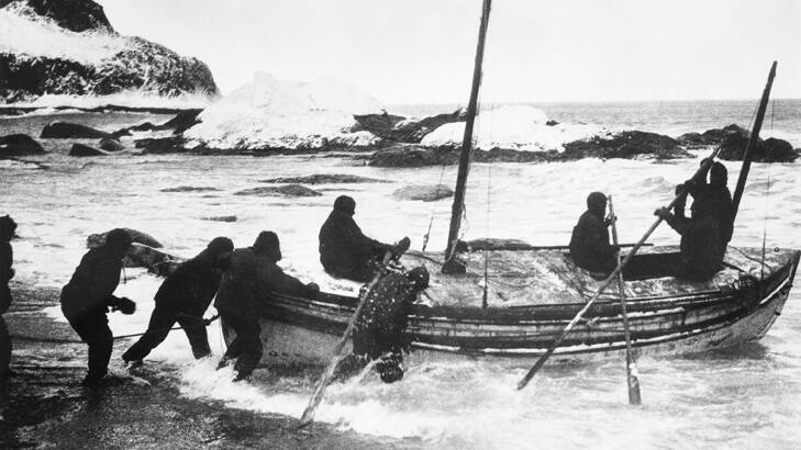 Ernest Shackleton's rowing boat, the James Caird, is launched from Elephant Island in 1916. Photo taken by expedition photographer, Frank Hurley.