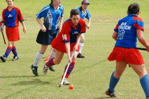 BALL CONTROL:  Knights player Sarah Gardner tries to weave her way through the defence.