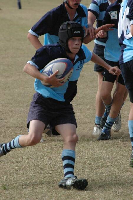 GOOD FORM:  Patrick McCallum in action for the Dolphisn at Broulee on Saturday.