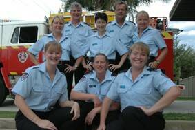 FIREFIGHTING FORCE: Meet some of the Bay’s finest this Saturday. They could include Batemans Bay Fire Brigade vice-captain Alan Fitches and Captain Eddy Maeseele with female firefighters (back) Rhianon Harrington, Donna Carey, Lysanne Cameron, (front) Laura Backus, Erica Bryant and Kelly Elfrink.