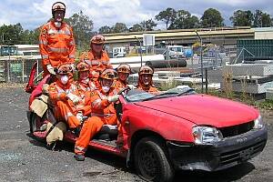 CUTTING EDGE:  Moruya SES members in the remains of a three-door hatchback being used for practise. Rear: Andy Dunn (standing), Peter Collins. Middle: Wayne Gwynne, Michael Sheely, Karen Tritton. Front: Kristina O’Brien and Lloyd Jones.