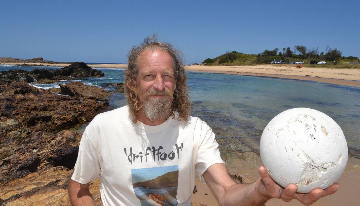NAROOMA: Ephemeral artist Dean Ware with his latest creation – a ball made of pumice he found on the beach at his new home at Mystery Bay. He plans to exhibit other pieces at the upcoming Bermagui Sculpture on the Edge.