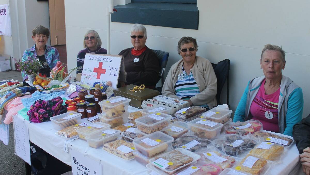The ladies of the Candelo/Kameruka Red Cross at their election day fundraising stall (from left) Jenny Slater, Wendy Croese, Irene Smith, Elaine Wilton and Rhonda Troy.
