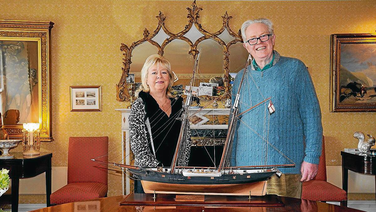 EDEN: Lord Boyd and Barbara Rivers with the original shipwright’s model of Wanderer at Ince Castle, Saltash in the United Kingdom. Ben Boyd was Lord Boyd’s great-great-uncle on his father’s side. Photo: David Marsh.