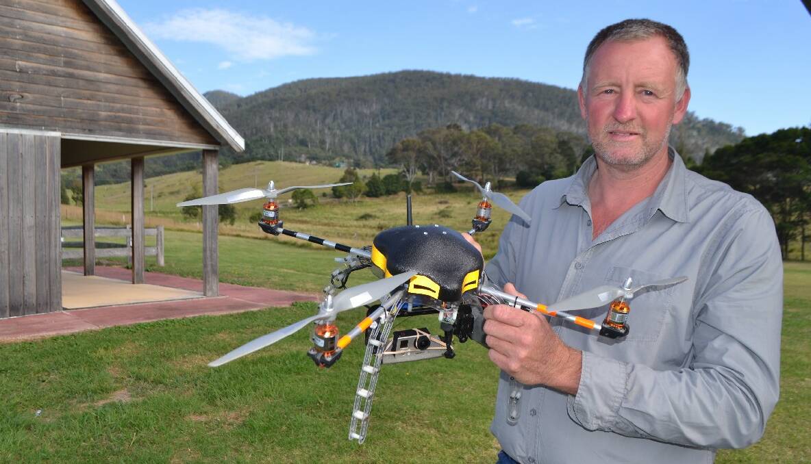 TILBA: Warren Purnell from Project Vulcan Unmanned Aerial Systems and his custom built UAV or unmanned aerial vehicle, the perfect platform he says for assisting firefighters in their bushfire duties.