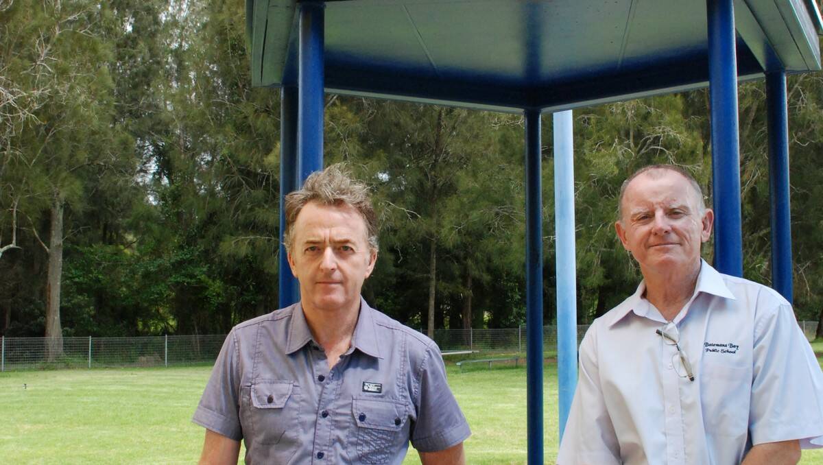 FINAL STRAW: Roy Willis installed this memorial in honour of his late son Dylan, but vandals have burnt 13 holes in the shade shelter overhead. After several vandal attacks last year, Batemans Bay Public School principal Tom Purcell wants the community’s help to track down the culprits.
