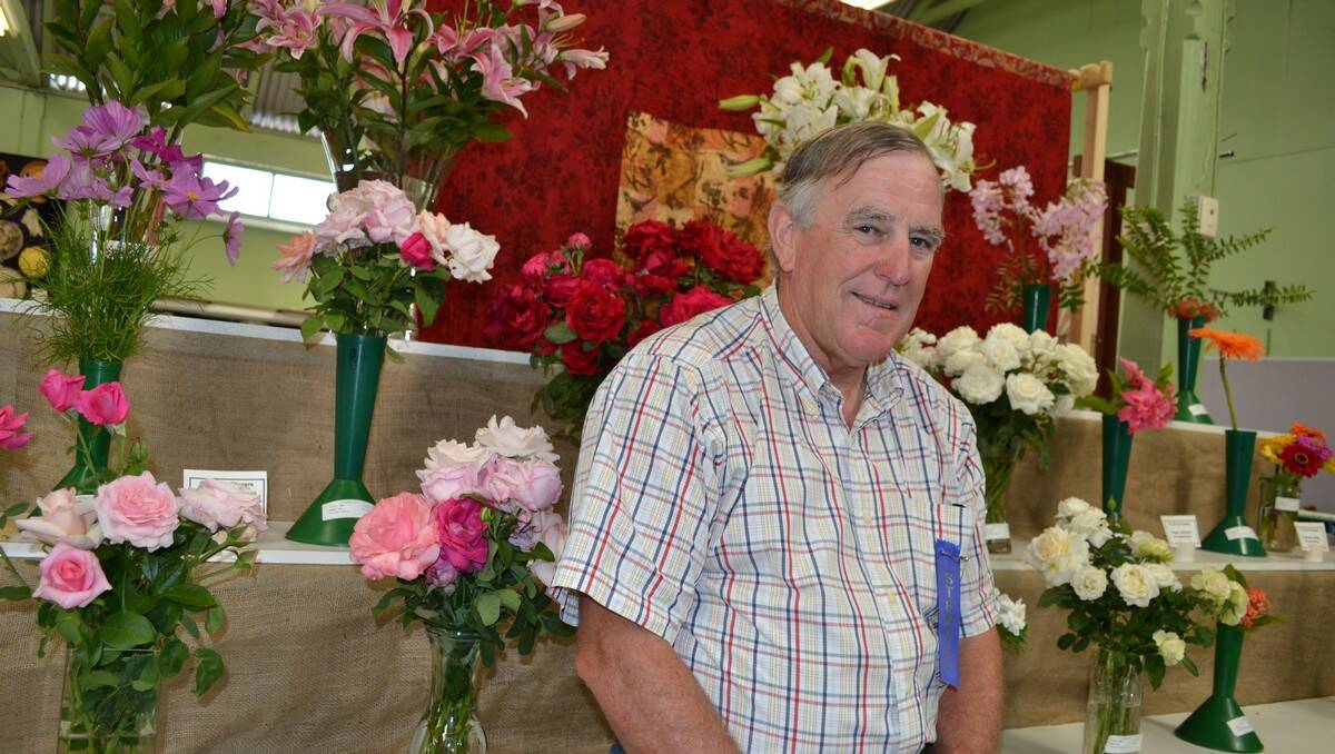 FLOWER POWER: Robert Richmond is a vegetable steward at the Eurobodalla District Show, but his heart lies across the corridor with his many lilies and roses.