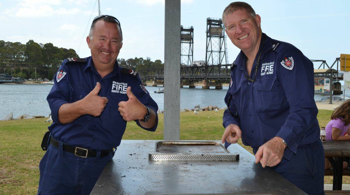 ALLOWED: It is safe to use an electric barbecue during a total fire ban, as long as it is under the control of a responsible adult at all times and no combustible material is within two metres, says Batemans Bay Fire and Rescue station officer Phillip Eberle and qualified firefighter Mark Gordon.