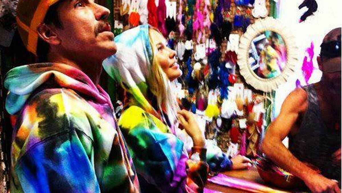 HOODIE FANS: Anthony Kiedis and Lara Bingle called in at the Hippie Sticks Shop in Bodalla and bought matching tie-dyed hoodies.