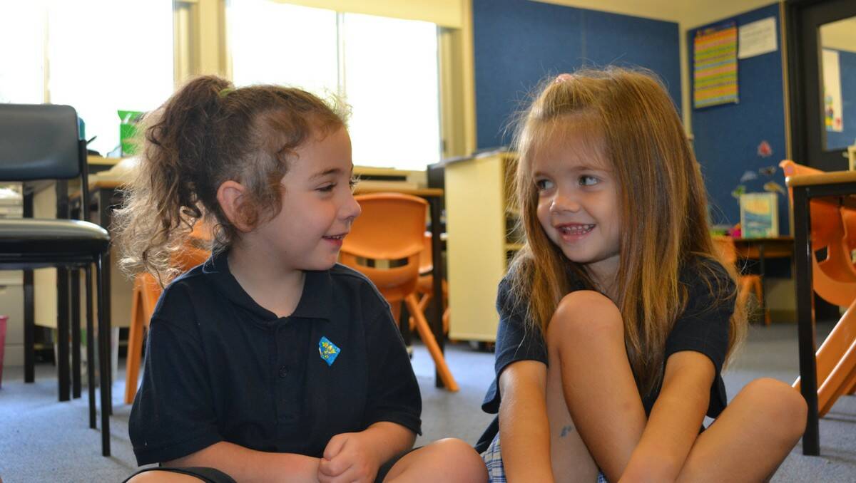 VOICE OF REASON: Full of good advice for kindy Danielle Wellington (right) is Year One Joey-Roze O’Donnell.