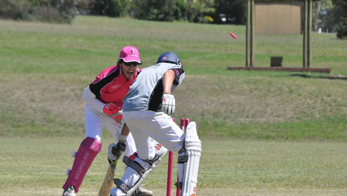 STUMPED: Tuross Head wicket keeper Anthony Hartshorn shows his joy after removing Lachlan Paterson’s bails in time. PHOTO: Dean Benson.