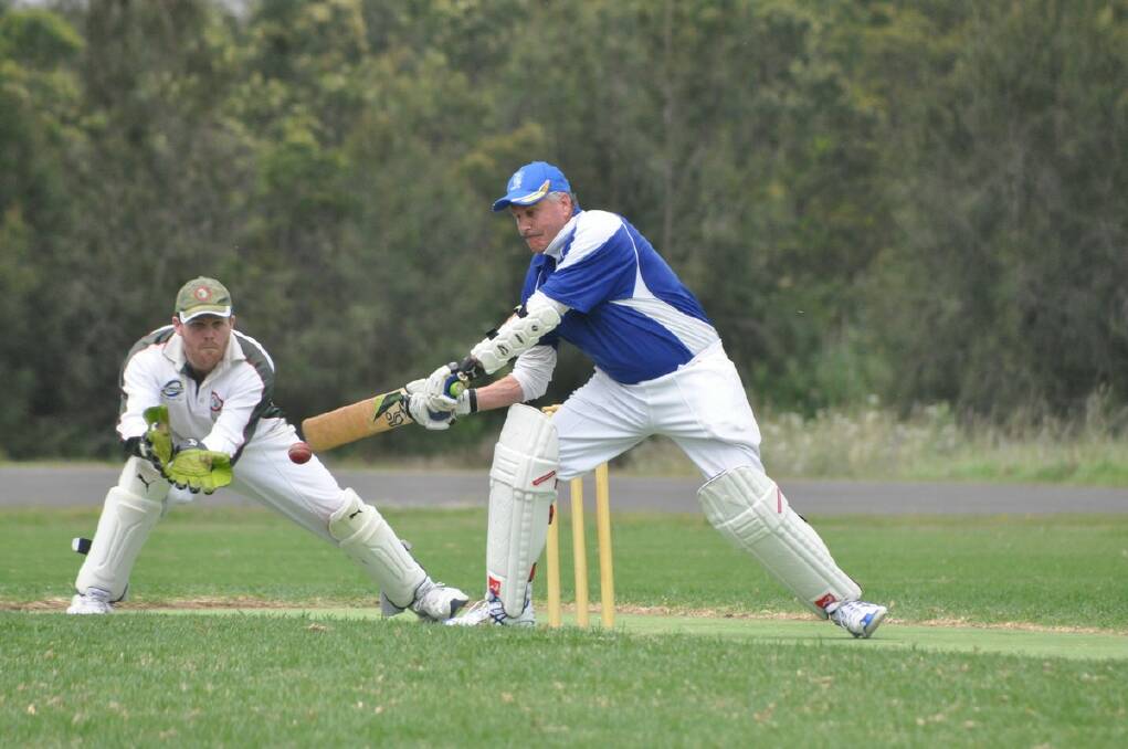 LOOSE CUT: Moruya batsman Paul Cullen chases a wide delivery last Saturday as Broulee wicket-keeper Jeremy Wales prepares his gloves. PHOTO: Dean Benson.