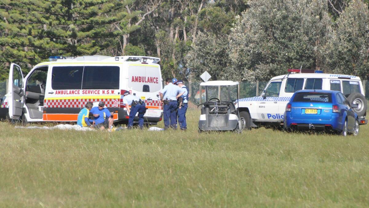 Paramedics and police at the scene of the skydiving accident in Moruya.