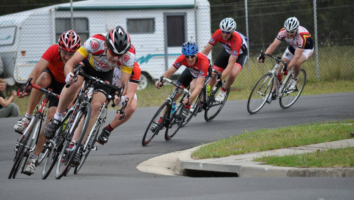 HOT PURSUIT: Dom Riddeaux leads out Dave Mullens in the C grade crit race.