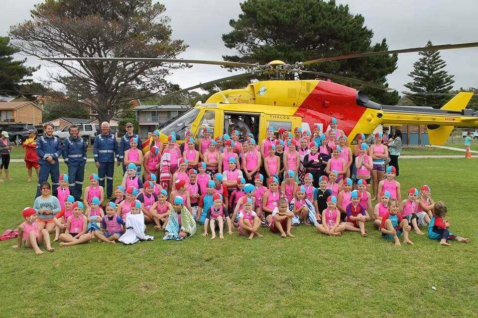  TONS OF FUN: More than 80 Nippers from the Batemans Bay Surf Life Saving Club enjoyed a visit from the Westpac Lifesaver helicopter at their Christmas party.