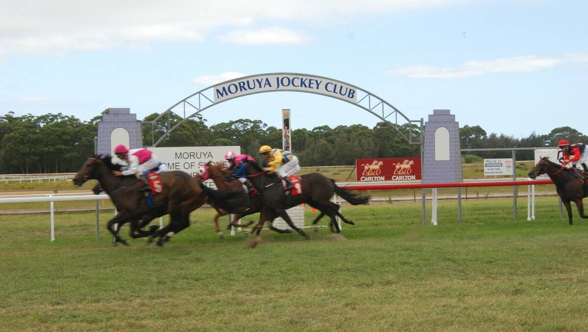The Narooma Cup attracted thousands of people to Moruya Racecourse on Monday as Full Hand trained by Brian Cox took home to the coveted cup. 