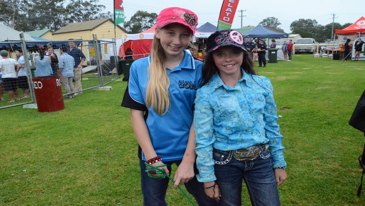 Hundreds of people braved the rain to watch all the action of the Moruya Rodeo on New Year's Day.