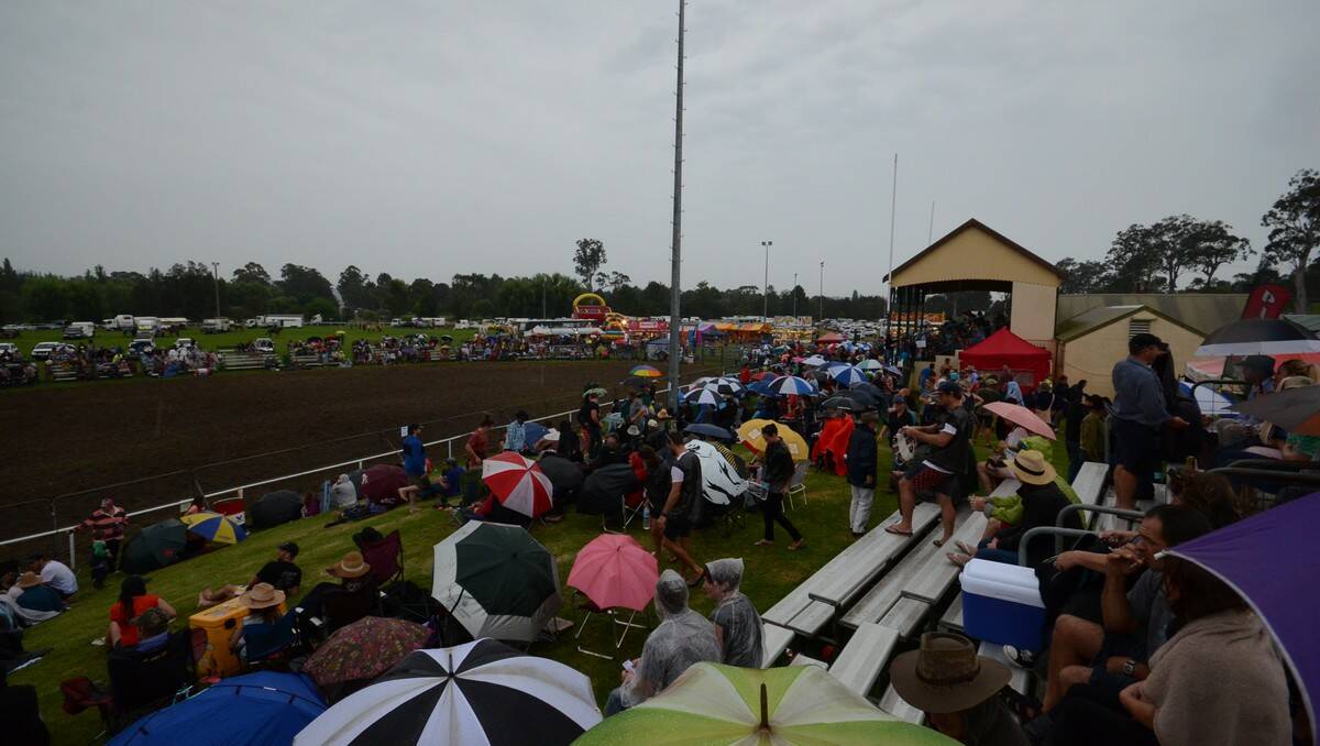 Hundreds of people braved the rain to watch the action.