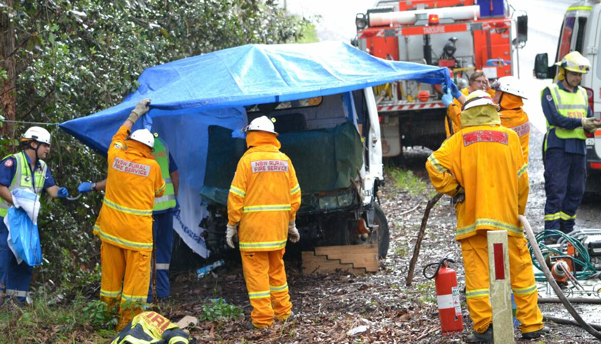 A MAN has died after the truck he was driving ran off the Princes Highway and into trees at Termeil, South of Ulladulla, this morning. Photos GLEN ELLARD.