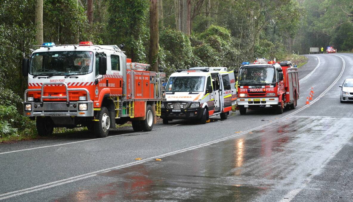 A MAN has died after the truck he was driving ran off the Princes Highway and into trees at Termeil, South of Ulladulla, this morning. Photos GLEN ELLARD.