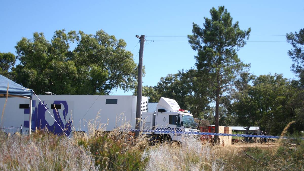 Police Special Crime Squad and forensic team have set their mobile units on the property under investigation which is about 10 kms east of Badgingarra townsite close to the primary school.  Photo Merrel Pond.