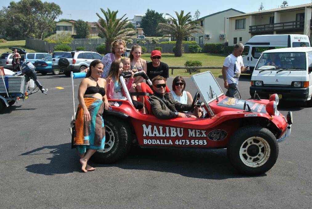 THE HOCKEY FAMILY: Mother of Ian's children Annette Hockey with Sarah, Aaron and Joshua with girlfriend Hannah and Ian's three grandaughters Courtney, Sammy and Jenna pose for a picture in the Malibu Beach Buggy.
