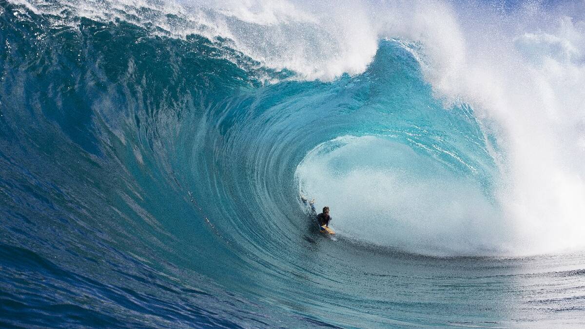 ULLADULLA: Burrill Lake bodyboarder Damien Martin gets deep inside a wave in Tasmania, scoring the front cover of Riptide magazine.