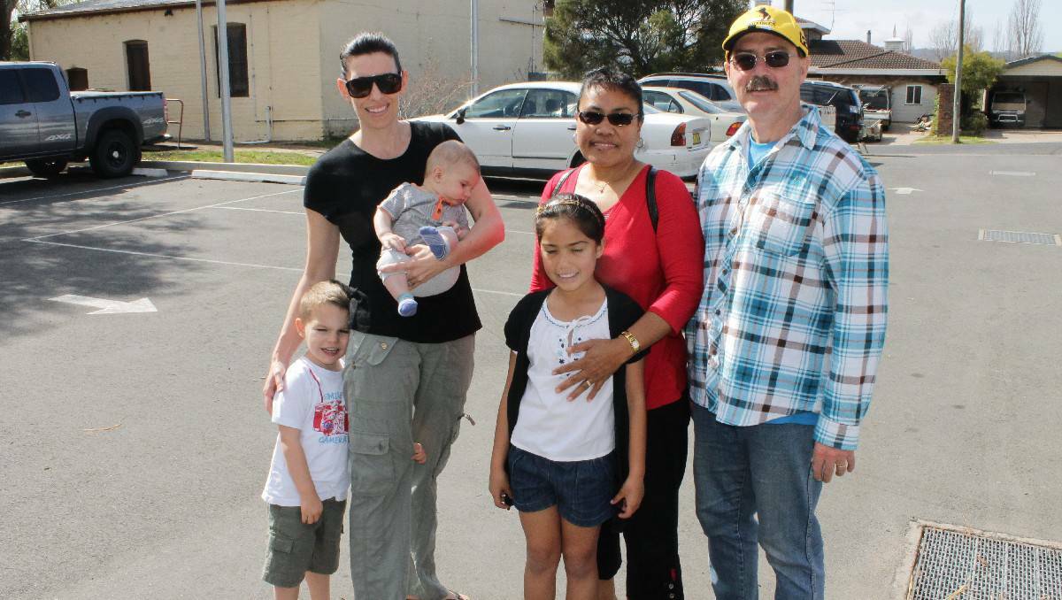 Voting at the Bega Valley Public School are (from left) Nate Bobbin, Megan Bobbin (holding Laine) and Alisi, Tino and Richardon Arbon.