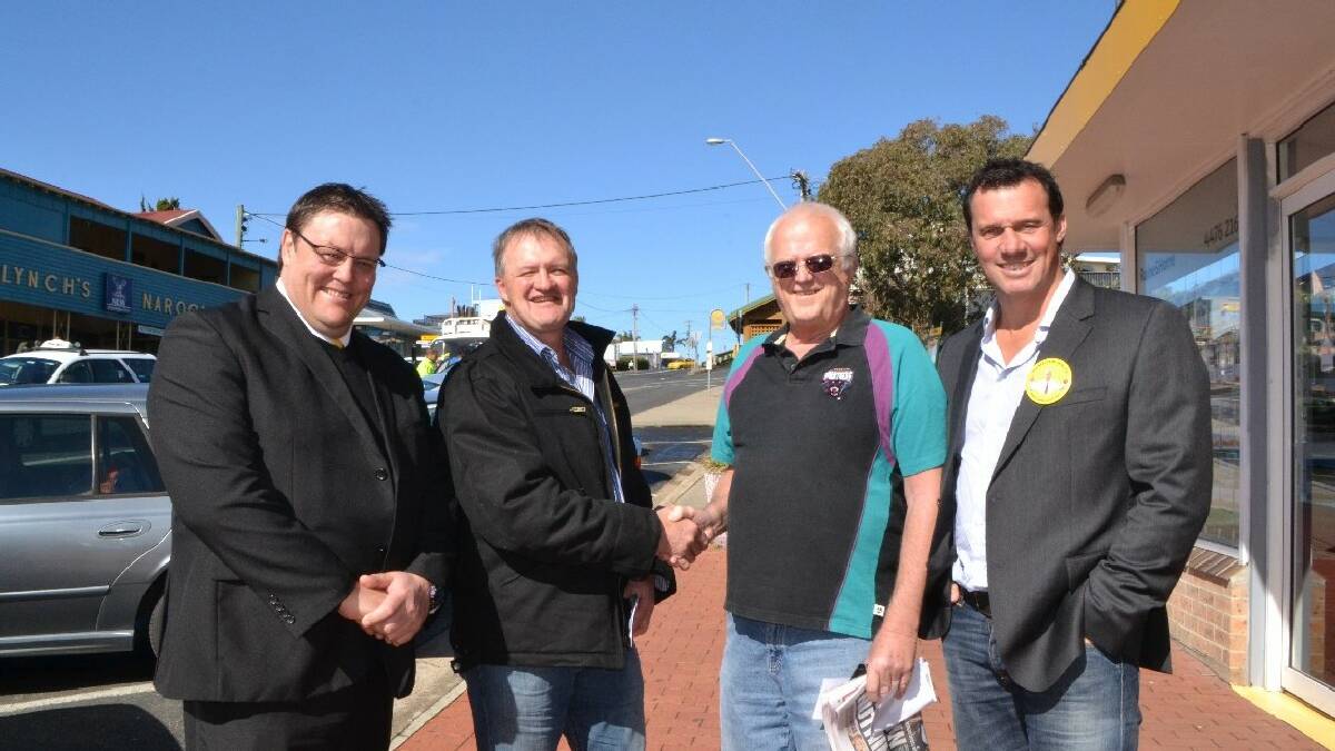 NAROOMA: Kianga resident Alan Ryan was among those who recognised NRL legends and Palmer Party candidates Glenn Lazarus and Matt Adamson who were campaigning with Eden-Monaro hopeful and Cooma mayor Dean Lynch in Narooma last week.
