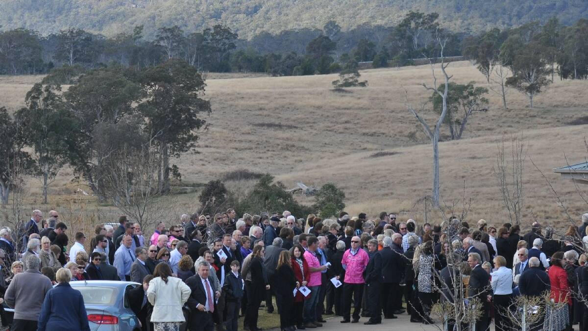 MERIMBULA: People spilled out of the Clavering Park Chapel on Monday, August 12 as they farewelled Merimbula pharmacist David Dodd who was killed in an accident in Sydney.