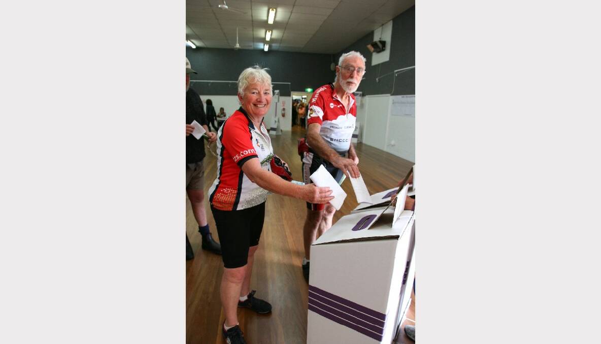 Casting their vote after a 70k bike ride, Gail Drury of Bermagui and Jack Ohalloran of Fairhaven at the polls in Bermagui for the 2013 election. 