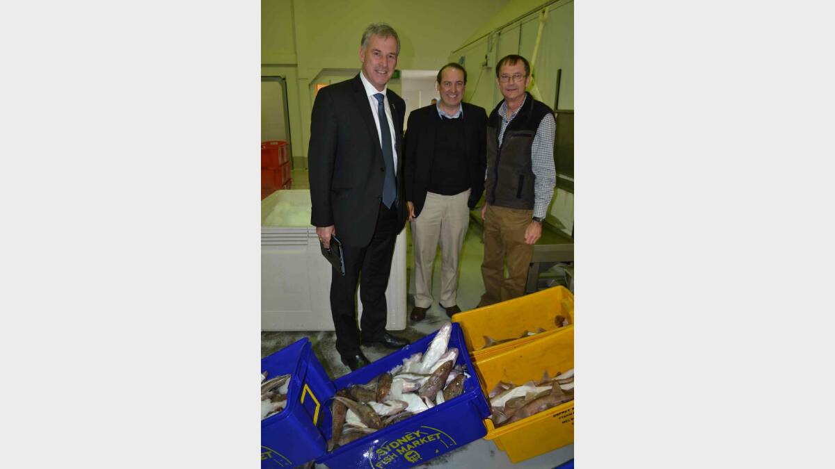 Tasmanian Coalition Senator Richard Colbeck with Liberal candidate for the Eden-Monaro Peter Hendy and Southland Fish Supplies CEO Steve Buckless.