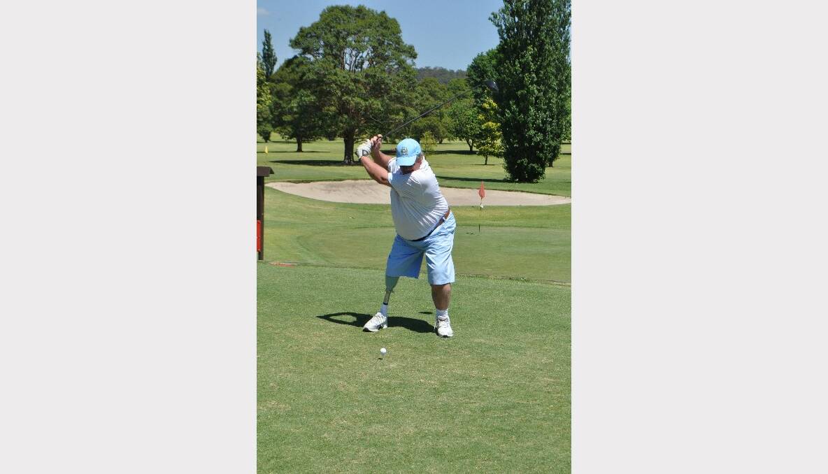 NOWRA: Graham Kenyon from Tweed Heads tees off for the NSW Amputee Golf Open at Nowra Golf Club on Saturday morning. Photo: PATRICK FAHY  