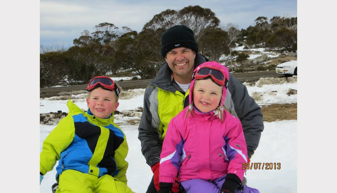 Geoff Pursell with his two children Wyatt and Bronte Pursell, enjoying the snow.