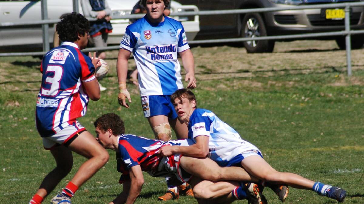 COOMA: Bombala's Jackson Standen (back) helped lead the Pambula/Merimbula/Bombala Bluedogs to a win against Bega in Cooma on   Sunday, putting them through to the Grand Final.