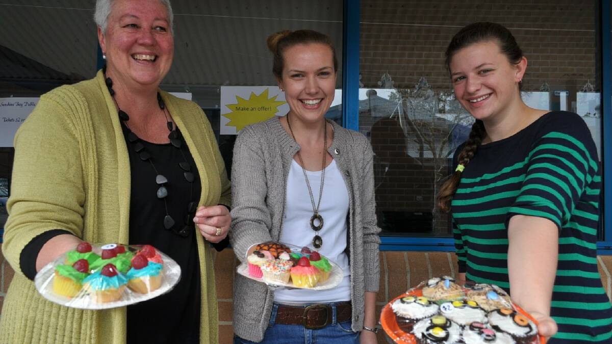 At Sunshine Bay Primary School Maree Deilman, Sarah Davis and Emily Watson selling cakes to hungry voters. 