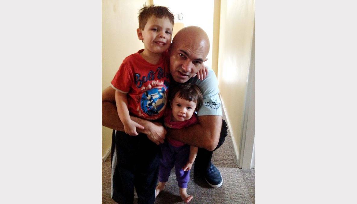 Jason with his children Noah and Maliyah.