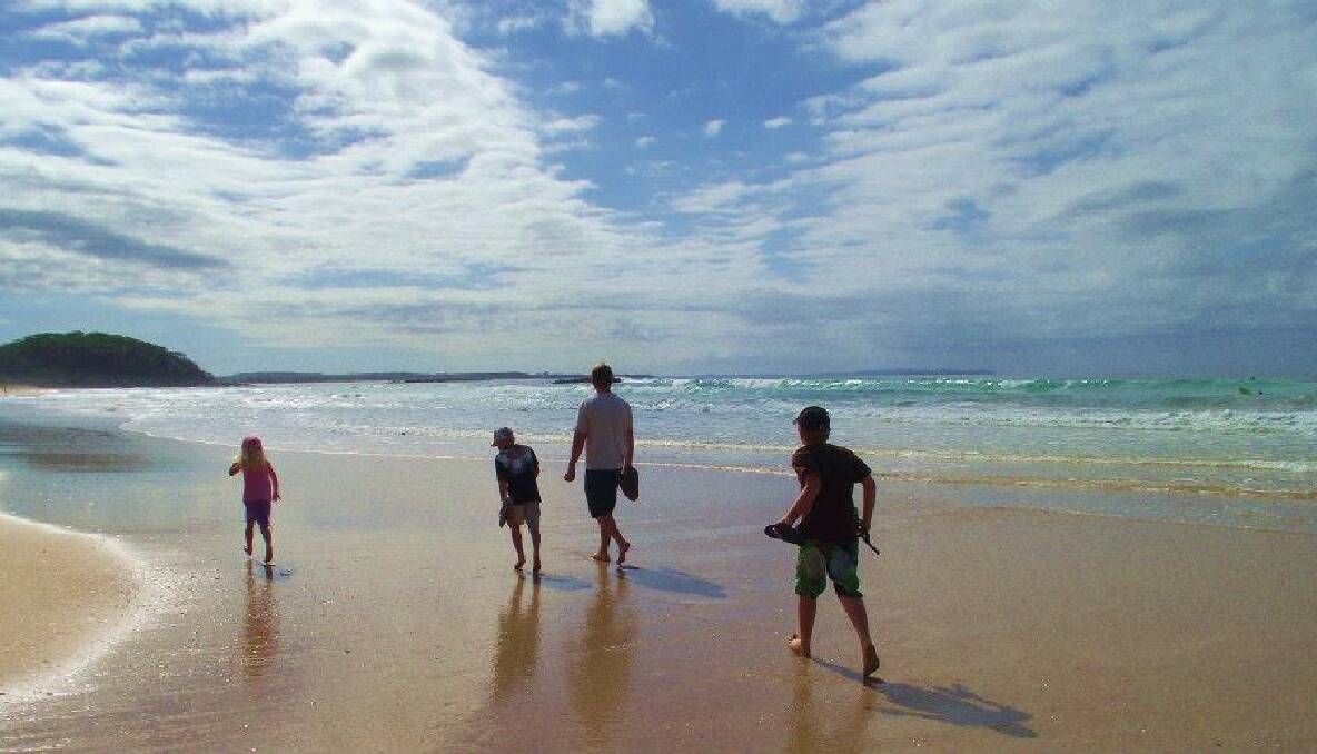 Braidden, Lochlan and Haylee Connolly enjoying a stroll along Narrawallee beach with their lovely daddy Matthew Connolly.