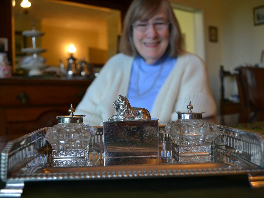 Milton-Ulladulla Historical Society member Joanna Ewin has a 110-year-old silver desk set which she says is entrenched in Milton's history and should be displayed in a village museum.